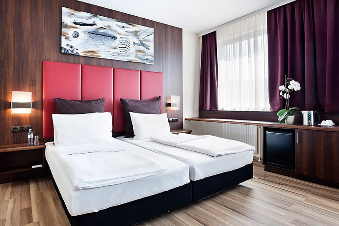 Imagen de la habitación del Hotel Das Reinisch Business. Foto 7