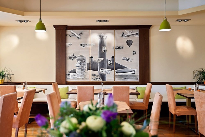 Imagen del bar/restaurante del Hotel Das Reinisch Business. Foto 4