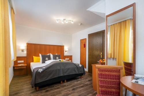 Imagen de la habitación del Hotel Das Schlossberg superior. Foto 7