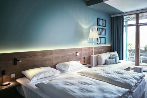 Imagen de la habitación del Hotel Das Sonnreich - Thermenhotel Loipersdorf. Foto 7