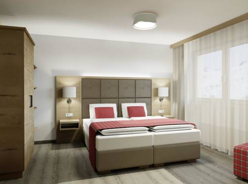 Imagen de la habitación del Hotel Das Tauernherz. Foto 8