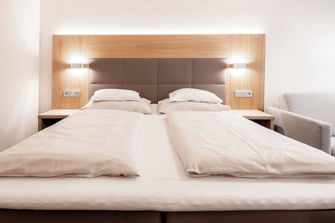 Imagen de la habitación del Hotel Das Walchsee Aktivresort. Foto 2