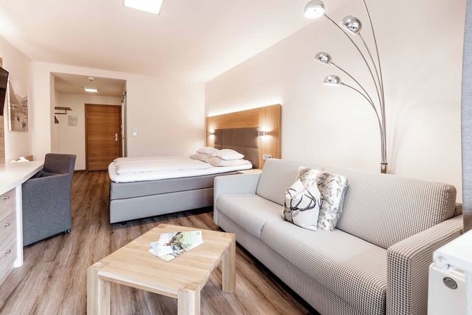 Imagen de la habitación del Hotel Das Walchsee Aktivresort. Foto 6