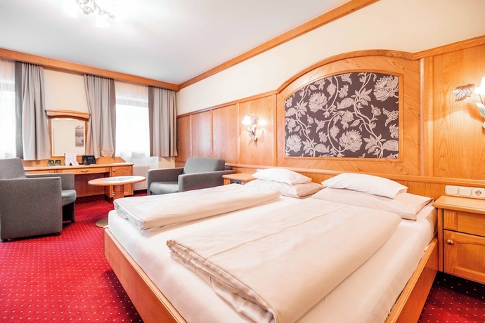 Imagen de la habitación del Hotel Das Walchsee Aktivresort. Foto 7