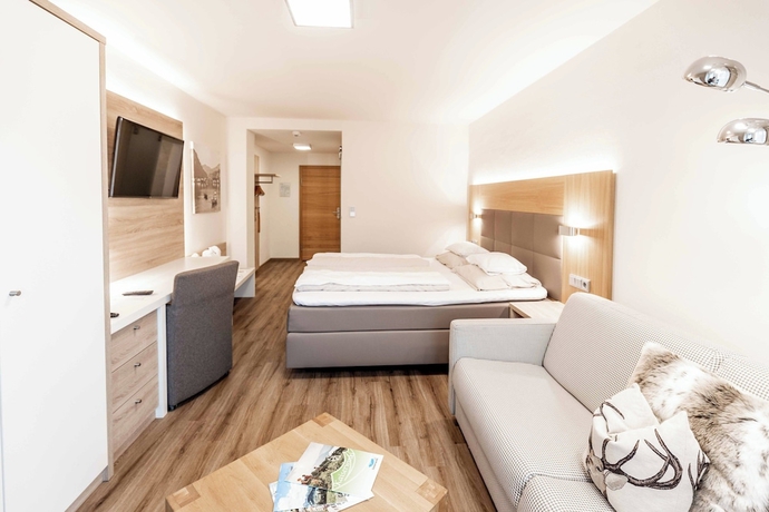 Imagen de la habitación del Hotel Das Walchsee Aktivresort. Foto 9