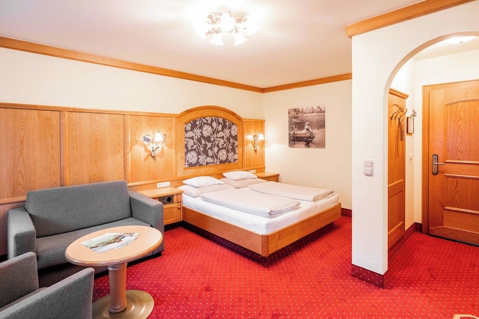 Imagen de la habitación del Hotel Das Walchsee Aktivresort. Foto 11