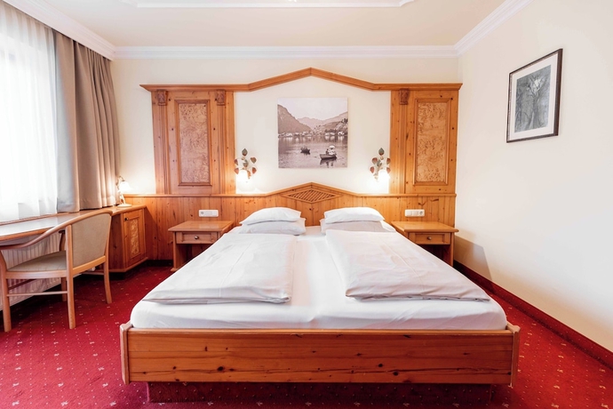 Imagen de la habitación del Hotel Das Walchsee Aktivresort. Foto 13