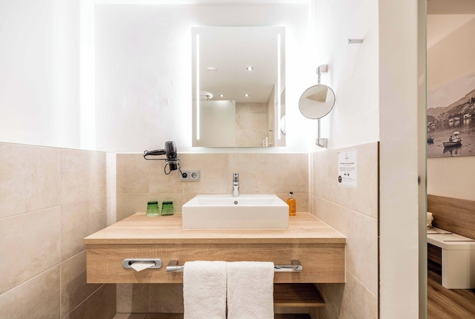 Imagen de la habitación del Hotel Das Walchsee Aktivresort. Foto 15