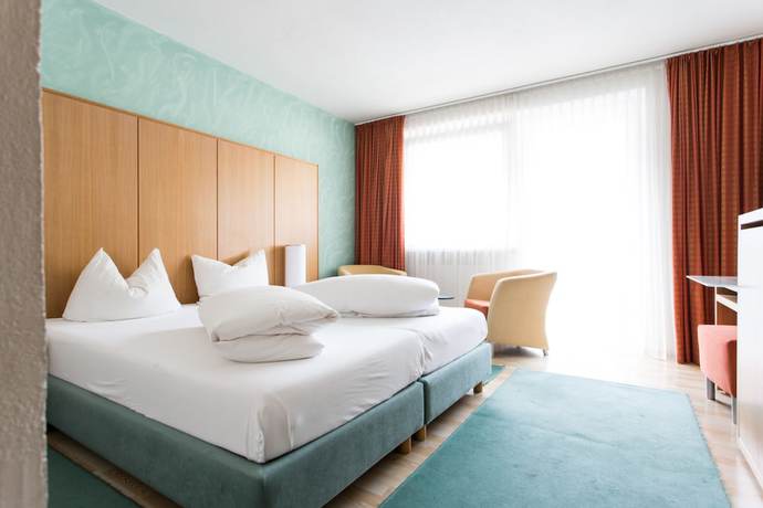 Imagen de la habitación del Hotel Das Zentrum. Foto 17