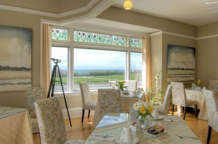 Imagen del bar/restaurante del Hotel Dashwood Manor Seaside Bed And Breakfast. Foto 2