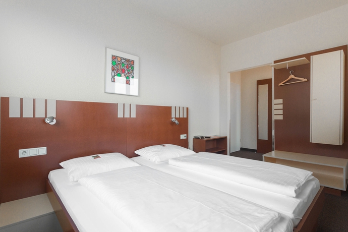 Imagen de la habitación del Hotel Daspaul. Foto 16
