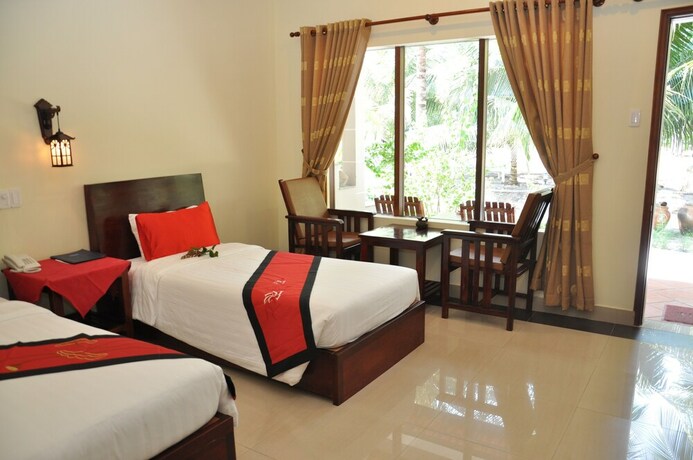 Imagen de la habitación del Hotel Dat Lanh Resort. Foto 31