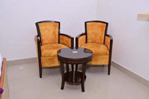 Imagen de la habitación del Hotel Date Palm. Foto 19