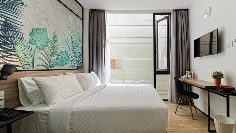 Imagen de la habitación del Hotel Daun Residence Bandung. Foto 23