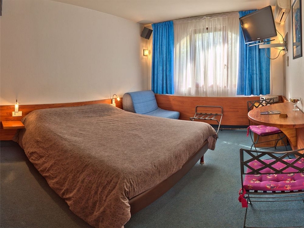 Imagen de la habitación del Hotel Dauphin Blanc. Foto 7