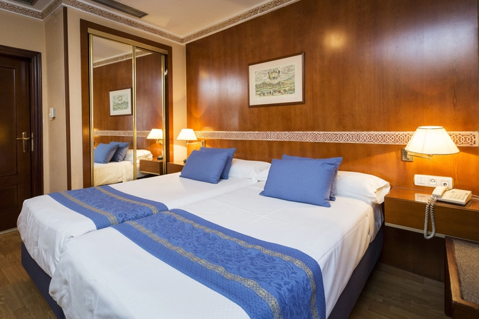 Imagen de la habitación del Hotel Dauro Premier. Foto 11