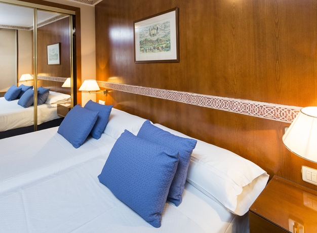 Imagen de la habitación del Hotel Dauro Premier. Foto 15