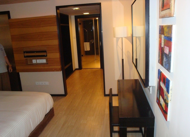 Imagen de la habitación del Hotel Davanam Sarovar Portico Suites Bengaluru. Foto 7