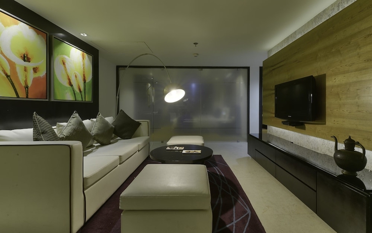 Imagen de la habitación del Hotel Davanam Sarovar Portico Suites Bengaluru. Foto 11