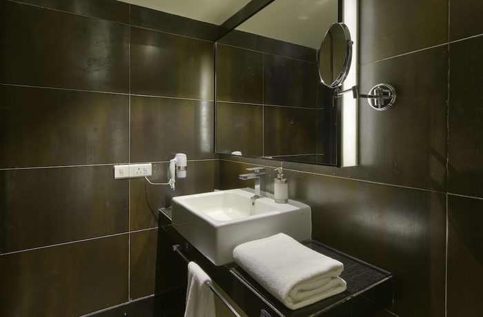 Imagen de la habitación del Hotel Davanam Sarovar Portico Suites Bengaluru. Foto 15