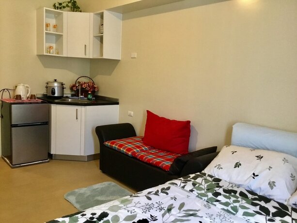 Imagen de la habitación del Hotel Davao Avida Towers By Jyu. Foto 19