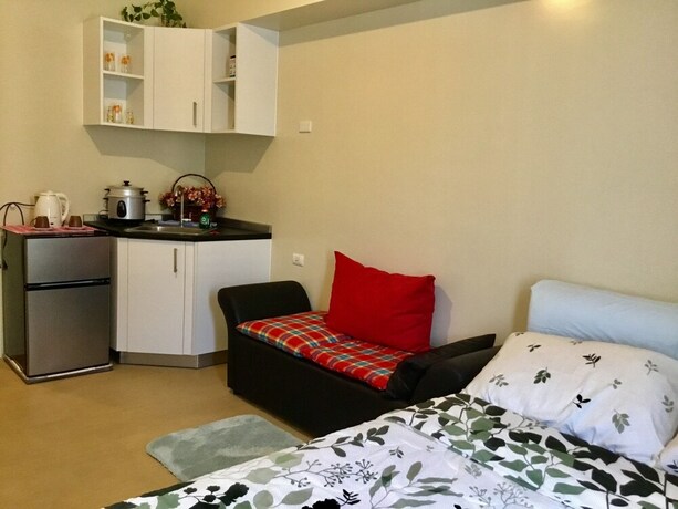 Imagen de la habitación del Hotel Davao Avida Towers By Jyu. Foto 25