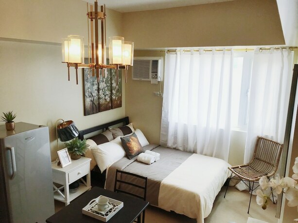 Imagen de la habitación del Hotel Davao Boutique Condos. Foto 22