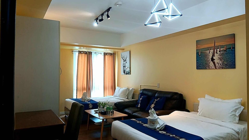 Imagen de la habitación del Hotel Davao Central Suites. Foto 2