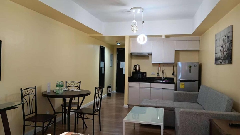 Imagen de la habitación del Hotel Davao Central Suites. Foto 6