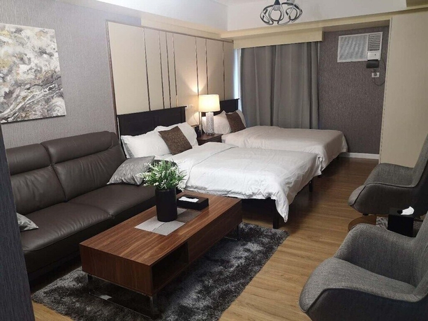 Imagen de la habitación del Hotel Davao Central Suites. Foto 8