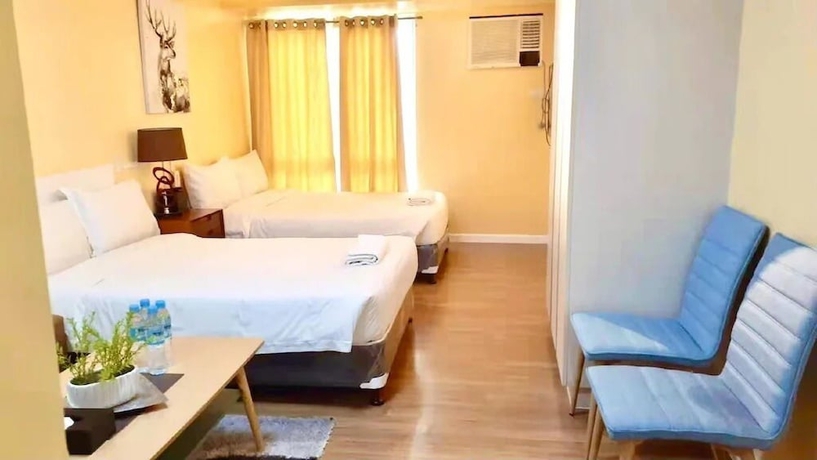 Imagen de la habitación del Hotel Davao Central Suites. Foto 10