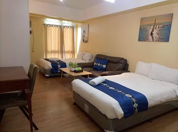 Imagen de la habitación del Hotel Davao Central Suites. Foto 12