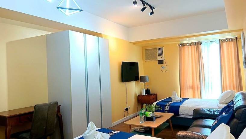Imagen de la habitación del Hotel Davao Central Suites. Foto 15