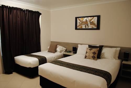 Imagen de la habitación del Hotel David Motor Inn. Foto 2