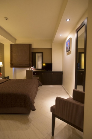 Imagen de la habitación del Hotel Davitel Tobacco. Foto 10