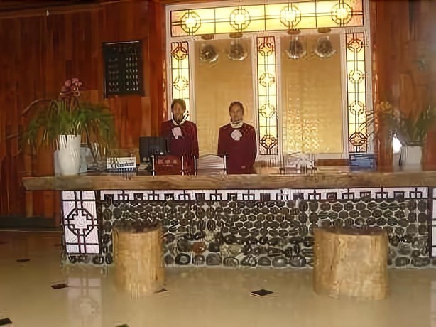 Imagen de la habitación del Hotel Daxianglong Tea Theme Hotel - Baoshan. Foto 5