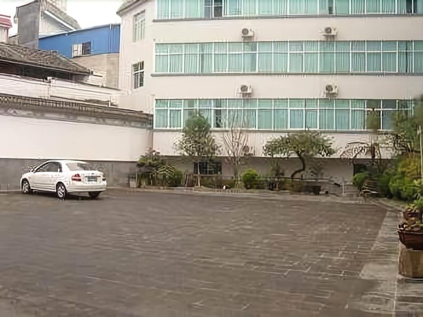 Imagen de los interiores del Hotel Daxianglong Tea Theme Hotel - Baoshan. Foto 15