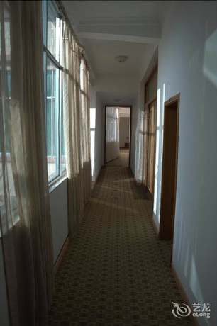 Imagen de la habitación del Hotel Daxianglong Tea Theme Hotel - Baoshan. Foto 8