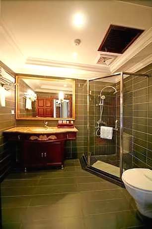 Imagen de la habitación del Hotel Daxianglong Tea Theme Hotel - Baoshan. Foto 9