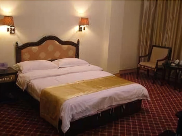 Imagen de la habitación del Hotel Daxianglong Tea Theme Hotel - Baoshan. Foto 10