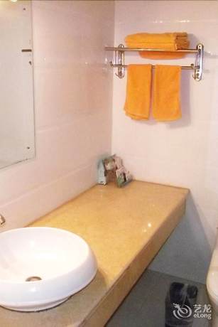 Imagen de la habitación del Hotel Daxianglong Tea Theme Hotel - Baoshan. Foto 12