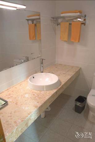 Imagen de los interiores del Hotel Daxianglong Tea Theme Hotel - Baoshan. Foto 16