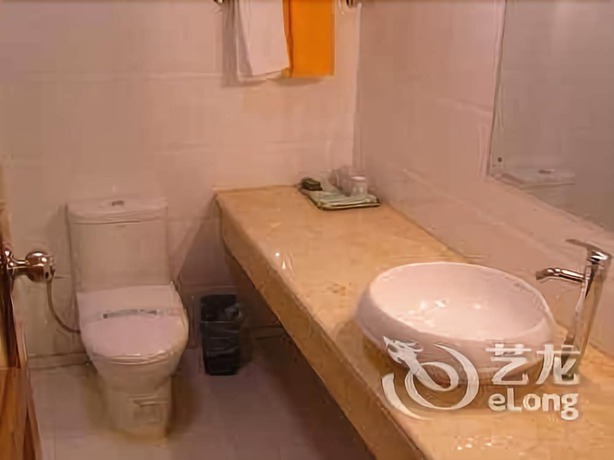 Imagen de la habitación del Hotel Daxianglong Tea Theme Hotel - Baoshan. Foto 13