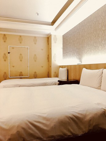 Imagen de la habitación del Hotel Daxin. Foto 2