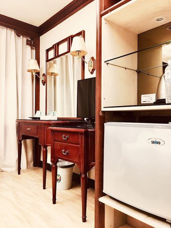 Imagen de la habitación del Hotel Daxin. Foto 4