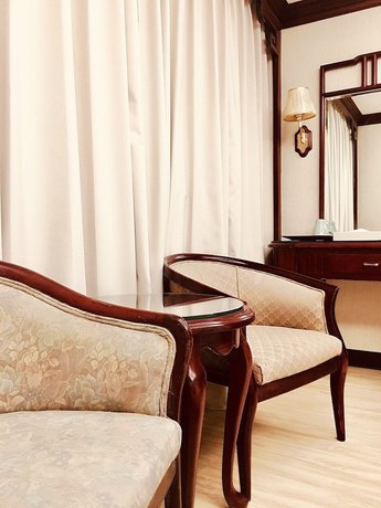Imagen de la habitación del Hotel Daxin. Foto 8