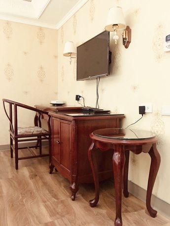 Imagen de la habitación del Hotel Daxin. Foto 10