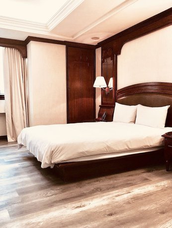 Imagen de la habitación del Hotel Daxin. Foto 11