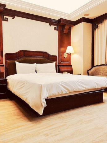 Imagen de la habitación del Hotel Daxin. Foto 14