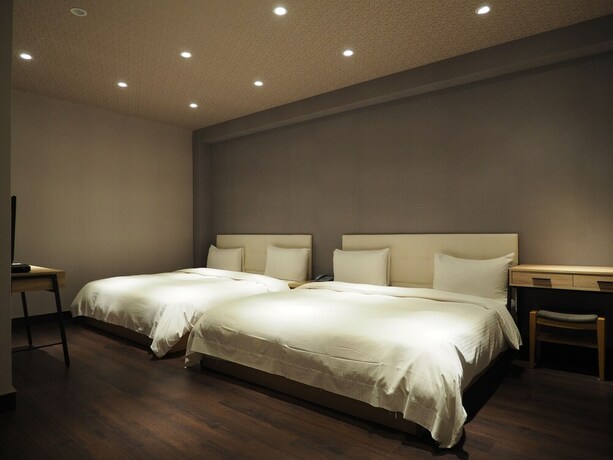 Imagen de la habitación del Hotel Day Chen. Foto 12